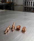 High grade copper tips from the 32 Piece Plasma Cutter Consumable Kit For PT-31 LGK40 for precision cuts.