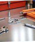 Concealed Hidden Cabinet Hinges 90 Degree Curved For Doors Two Piece Stainless Steel Industrial Grade Hinges on metal surface with tools