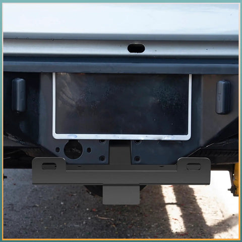 Rear view of mounted Beefy Winch Hitch Cradle Mount Plate with 2 Inch Receiver under vehicle bumper, black powder coated steel.