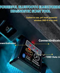 Compact Bluetooth OBD2 Scanner Diagnostic Tool connected under the dashboard with lights indicating power and connection status.