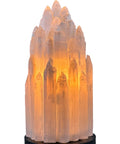 Handcrafted Selenite Lamp With Mountain Peak Design, Dimmable Bedside Night Light, white salt crystal glowing on table