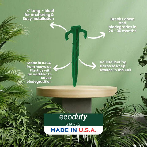 Contractor Grade Biodegradable 4 Inch Stakes displayed on a table, highlighting ribbed design and eco-friendly materials
