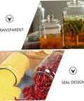 Level Up Your Pantry Setup With These Hella Tough 2 Liter Airtight Glass Tea Canisters And Food Storage Jar Set showcasing transparent jars with sealing lids.