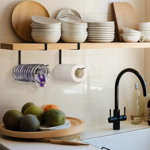 Absolute Knockout Tumbler Lid Organizer That Snaps Right Onto Standard Cups And Keeps Your Counter Dead Clean Without Any Hassle While Holding Ten Sip Lids In Chill Modern Black Design mounted under kitchen shelf.