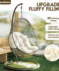 Waterproof Outdoor Egg Chair Cushion Replacement For Hanging Egg Chairs 47x33x7 Inches U Shaped Thick Pad Cream Mega Comfy Water Resistant Pad For Hammock Swing Chairs installed on an outdoor swing chair.