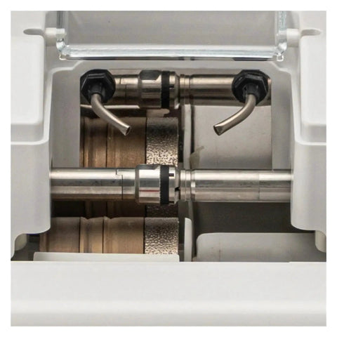 Close-up of the cutting module in the Built Tough 2d Patternless Auto Lens Edger Machine for precise lens shaping.