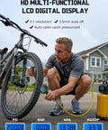 Man using Universal Presta And Schrader Valve Adapter With 200 PSI Pressure Gauge Dual Port Inflator Hose on bicycle tire