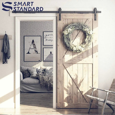 Installed Soft Close Barn Door Hardware Kit For 42 Inch Door Fits 5 To 10 Feet Track In Two Solid Pieces showcasing a cozy living room