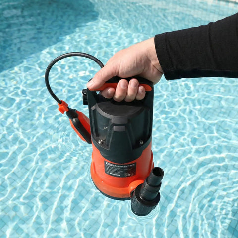 1HP Submersible Water Pump With Auto Float Switch 3700GPH High Flow Plus 31ft Lift, handheld above a pool for drainage use.