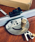 Rock Solid Upgraded Miter Gauge With 27 Tight Angle Stops And Smooth Adjustable Aluminum Head For Table Saw Crosscuts Router Tables Band Saw Bullseye Precision Jig Silver Pro Woodworking Accessory on wooden surface.