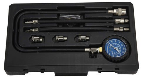 Front view of OTC 5606 compression tester kit for gasoline engines in a black case with blue gauge and hoses
