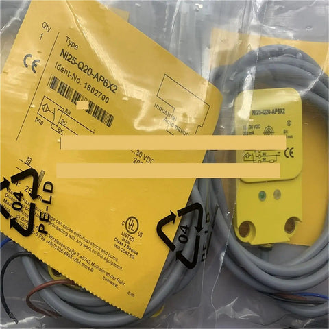 Proximity Switch Sensor NI25-Q20-AP6X2 in packaging, showing industrial grade non-contact sensor with wiring for automation systems.