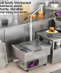 Built Tough Commercial Fryer Oil Filter Machine With Five Layer Stainless Steel Cartridge And Quick Automatic Return Flow For Real Restaurant Hustle Straight Up 10 Gallon Size in a kitchen setting.