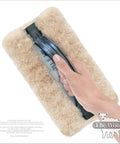 Hand holding Faux Painting Starter Toolkit For Beginners Full Sized 9.75 By 5 Inch Set With Three Quarters Inch Nap Sheepskin Tools USA Made