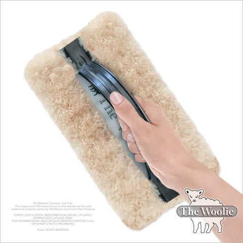Hand holding Faux Painting Starter Toolkit For Beginners Full Sized 9.75 By 5 Inch Set With Three Quarters Inch Nap Sheepskin Tools USA Made