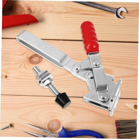 Two Pack Quick Release Toggle Clamps For Welding And Woodworking Iron Fixed Holding Clamps That Secure Materials During Welding And Assembly Heavy Duty Lock Down Fixtures For Precise Workholding Tools Easy Grip with red handle on wooden surface.
