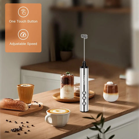 Rechargeable USB C Milk Frother With Stand, Handheld Wand With 3 Heads And 3 Speeds For Latte Cappuccino Matcha Almond Milk And More, Easy To Clean, Barista Quality At Home on kitchen counter with coffee cups