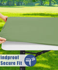 Person fitting a Stretchy Picnic Table Cover With Bench Covers For 6 Foot Rectangular Tables Elastic Fitted Spandex Tablecloth Washable Outdoor Patio Gear For Backyard Hangouts Sage Green 30x72 on a table.