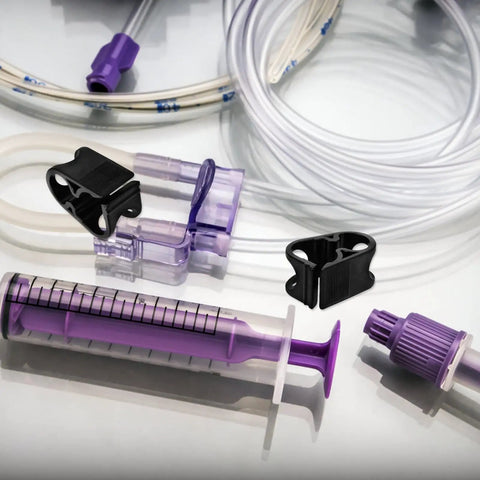 Adjustable Plastic Tubing Clamps Set Of 5 For Water Flow Control And Hose Shut Off Clips next to tubing and syringe