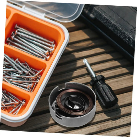 Built Tough Drill Press Quill Feed Return Spring And Replacement Coil Kit Heavy Duty Steel 2.04 By 1.75 Inches with screws and screwdriver.