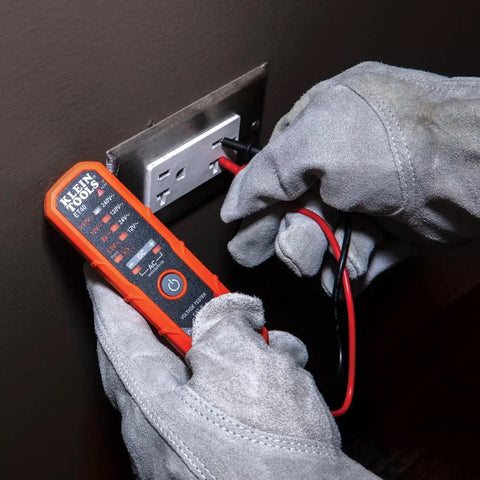 Person using Ultra Handy Electrical Test Kit With Digital Clamp Meter And Non Contact Voltage Tester on outlet