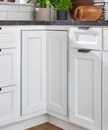 24 Inch Dual Tier Lazy Susan For Corner Kitchen Cabinets shown in a modern kitchen corner cabinet setting.