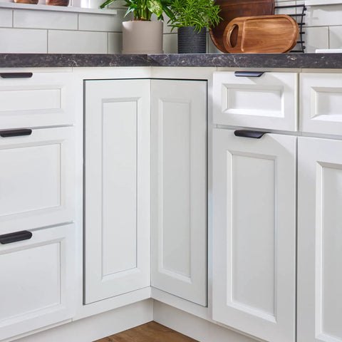 24 Inch Dual Tier Lazy Susan For Corner Kitchen Cabinets shown in a modern kitchen corner cabinet setting.