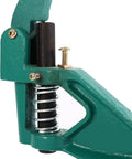 Close-up of Grommet Eyelet Hand Press Tool With Interchangeable Dies, showing spring mechanism and metal components.