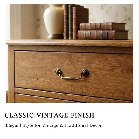 Vintage Bail Drawer Pull Set 4 Pack Antique Brass Cabinet Handles 3.75 Inch on wooden dresser with books on top.