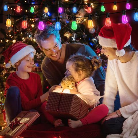 Family enjoying Christmas with multicolor outdoor string lights 100Ft LED patio lights with 55 shatterproof Edison bulbs rainbow colors