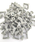 Heavy Duty Drywall Anchor Kit Two Pack With Anti Turn Ribbed Expansion Design For Secure Shelf Mounts In Soft Or Hard Drywall Rust Resistant Self Fasteners For Sturdy Wall Hangs, pile of gray plastic anchors