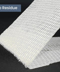 Close-up view of Double Sided Carpet Tape Removable And Residue Free Rug Gripper for Hardwood Floors, showing clear texture.