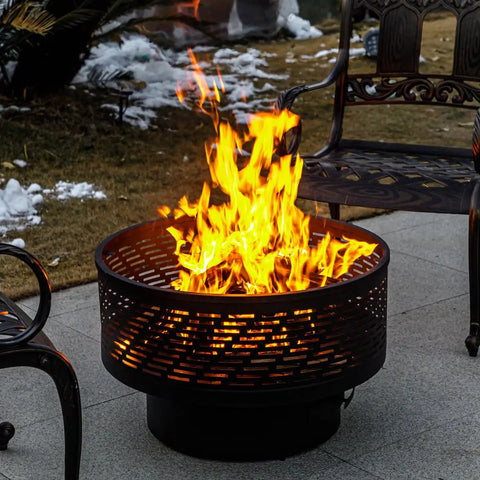 26 Inch Wood Burning Fire Pit Table With Grill And Lid for backyard BBQs and bonfire nights, lit on a patio.
