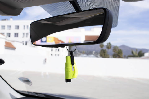 Emergency Keychain Car Escape Tool Pack Of 2, 2-In-1 Seatbelt Cutter And Window Breaker hanging from rearview mirror