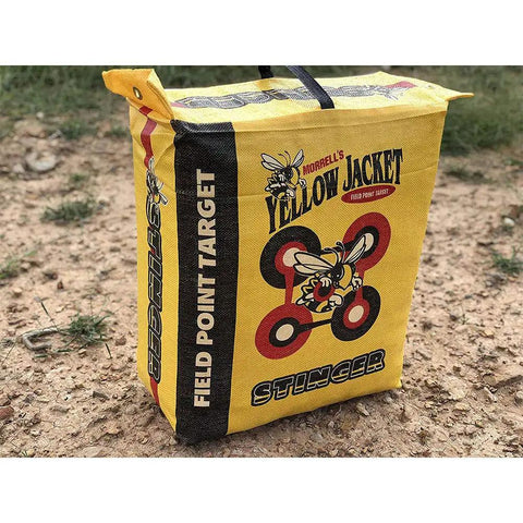 Yellow Jacket Stinger Field Point Archery Target Bag With Dual Sides And Ten Bullseyes on dirt background.