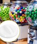 White Plastic Control Knob Replacement Part For Vending Machines And Ashapon Units next to colorful gumball machines.