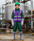 Premium Welding Safety Goggles With Impact Resistant Anti Splash Dark Green Tinted Lenses Designed For Heavy Duty Industrial Grind And All Day Comfort That Will Kick Butt On Any Build Or Fabrication Project, worn by a worker in protective gear in an industrial setting.
