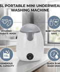 Compact Mini Countertop Washer With Spinning Dehydration Basket And Sanitary Blue Light Mode For Undies Socks And Baby Clothes Delivers Big Time Fresh Results While Making Laundry Day Hella Easy And Completely Hassle Free on a countertop with ergonomic design and control panel.
