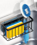 Kitchen Sink Sponge Holder Caddy With Suction Cups And Adhesive Strips holds blue scrubber and sponge beside sink