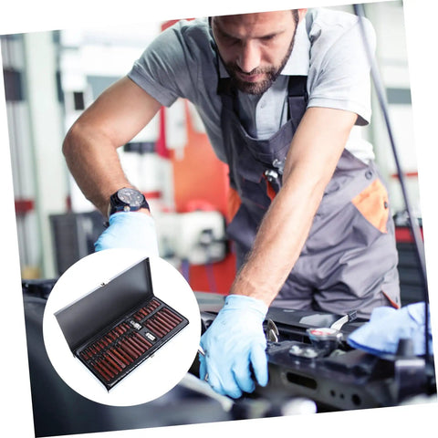 Professional Spline And Star Bit Socket Set Featuring Ergonomic Comfort Handles in use by a mechanic with gloves.