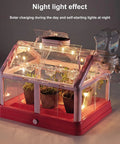 Kid Friendly Plant Growing Kit Greenhouse Set For Diy Terrarium Science, Indoor Gardening Toy With Solar Powered Panel, Drip Irrigation System, Living Greenhouse For Educational Fun showing illuminated greenhouse with plants and solar panel.