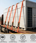 Built Tough 2 Inch By 30 Foot Flat Hook Ratchet Straps 10 Pack Orange Heavy Duty Cargo Tie Downs 10000 Lb Break Strength securing cargo on a truck.