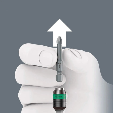 Hand demonstrating bit insertion in Kraftform Kompakt Turbo Imperial 1 19-Piece Screwdriver Set with Turbo Boost