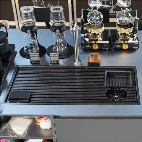 Heavy Duty Stainless Steel Bar Glass Rinser With High Pressure Flush Nozzle And Quick Drain Drip Tray Smooth Coffee Brewing Setup For Zero Splash Cups At Home Or Tap Room, top view on countertop with brewing equipment.