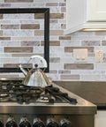 Kitchen backsplash with Peel And Stick Marble Look Tiles 12x12 Inch For Kitchen Backsplash And Bathroom, Water And Heat Resistant, Easy DIY Cut To Fit, Self Adhesive Wall Tile That Covers Way More Space Than A 10x10, featuring a stove and kettle.