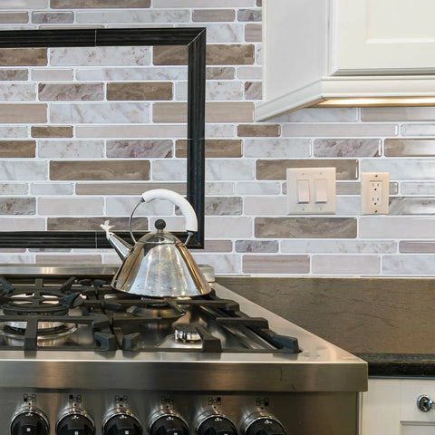 Kitchen backsplash with Peel And Stick Marble Look Tiles 12x12 Inch For Kitchen Backsplash And Bathroom, Water And Heat Resistant, Easy DIY Cut To Fit, Self Adhesive Wall Tile That Covers Way More Space Than A 10x10, featuring a stove and kettle.