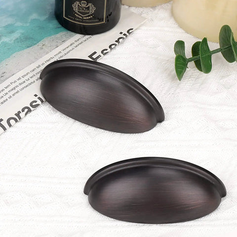 12 Pack Oil Rubbed Bronze Cabinet Pulls Featuring 3 Inch Hole Centers And Hella Sturdy Zinc Alloy Build For Kitchen Drawer Cup Handles With A Smooth Finish That Makes Installation Total No Sweat - close-up view
