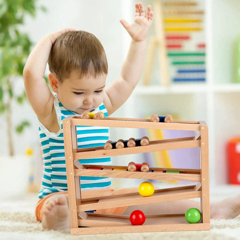 Child playing with Wooden Race Track Ramp Toy For Toddlers 5 Level Car Ramp Set With 4 Wood Cars And 3 Balls No Assembly
