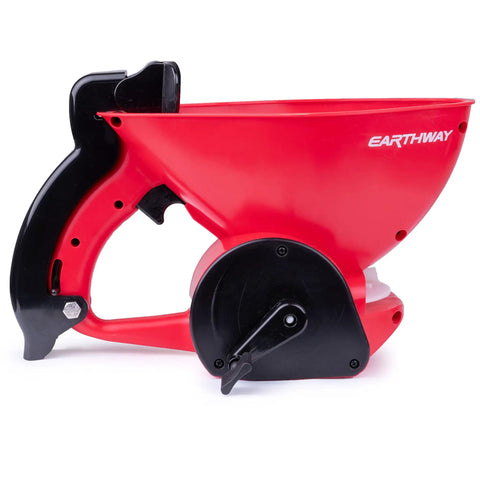Side view of a Red Ergonomic Hand Spreader With Built In Armrest And Trigger For Comfort Adjustable Reel Control Sealed Gearbox