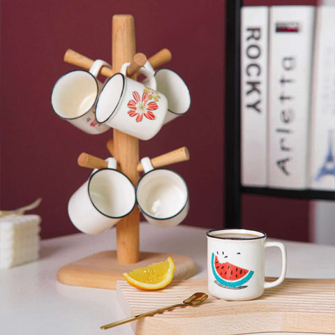 Four Pack Ceramic Demitasse Espresso Cups, 4.23 Oz Small Coffee Mugs For Espresso Machines And Home Coffee Makers hanging on stand